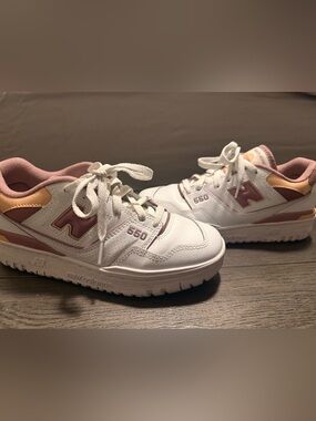 New Balance women’s 550 White and Pink Accent Sneakers